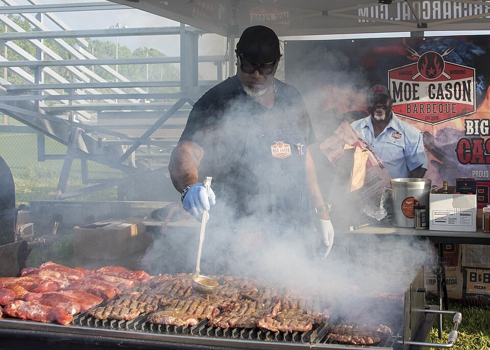 Moe Cason barbecuing for service members in Diego Garcia in 2020