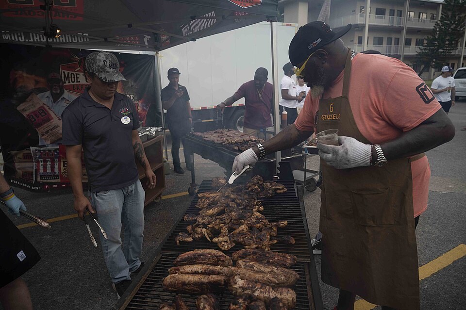 Moe Cason grilling at an event in Diego Garcia in 2023